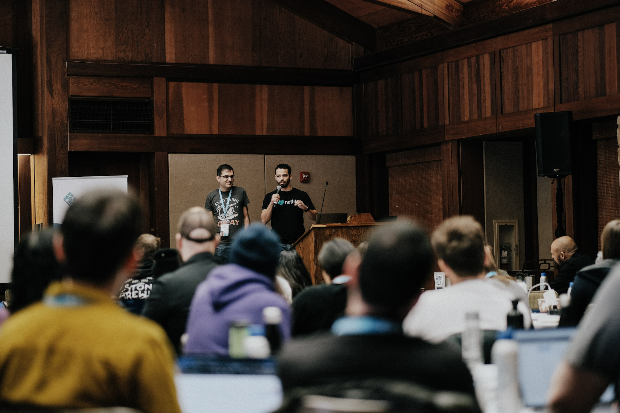 two engineers from the Netlify CMS team presenting from the stage